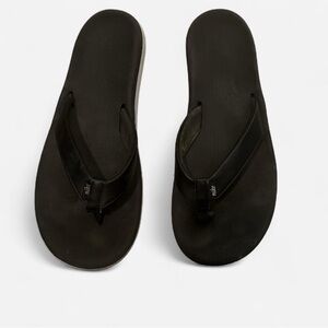 Size 8 Nike Women’s Black and White Flip Flops